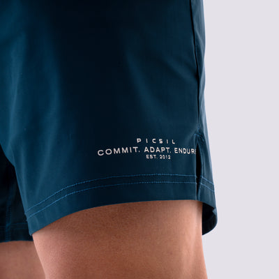 Short Deportivo Uomo Essentials FY26 